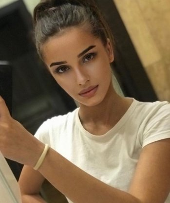 Мила
